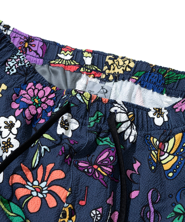 go slow caravan(ゴースローキャラバン) |ストレッチサッカー総柄プリントアンクルパンツ (MENS/WOMENS)